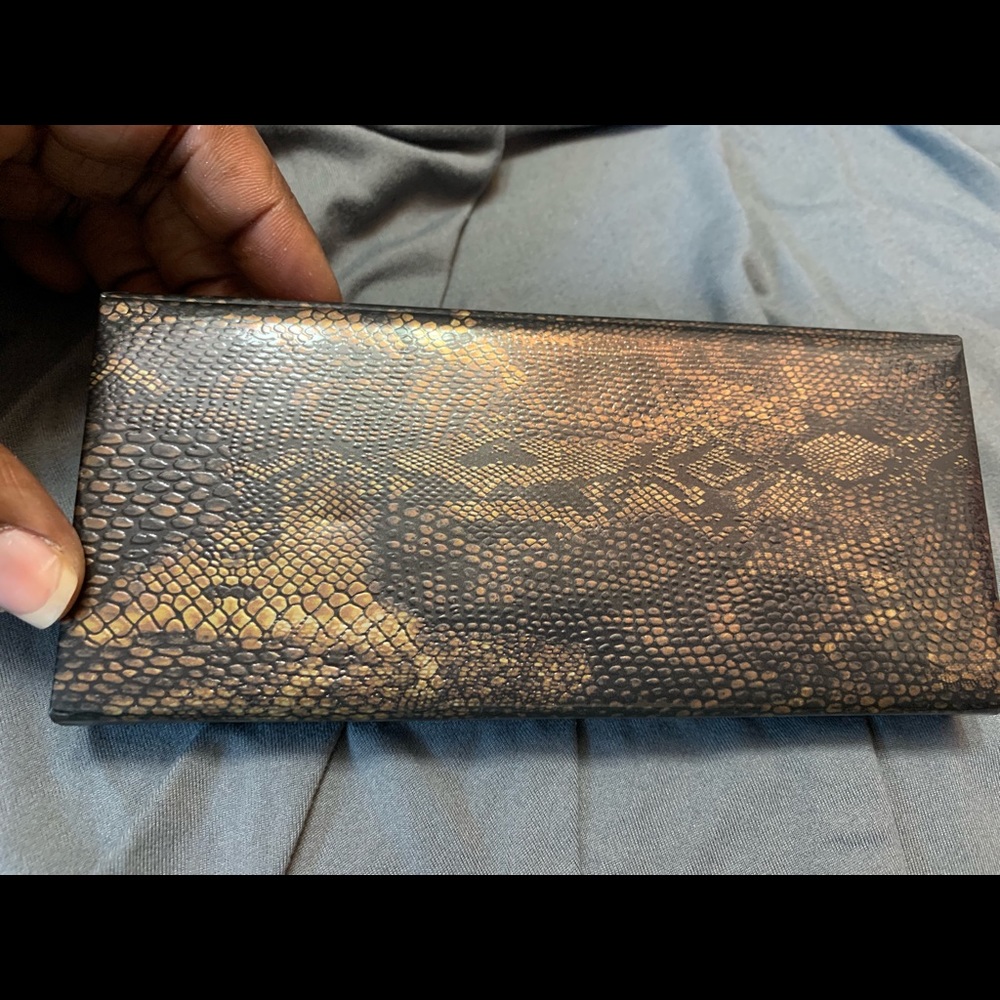 Laura mercier.  “Eye Art Caviar”